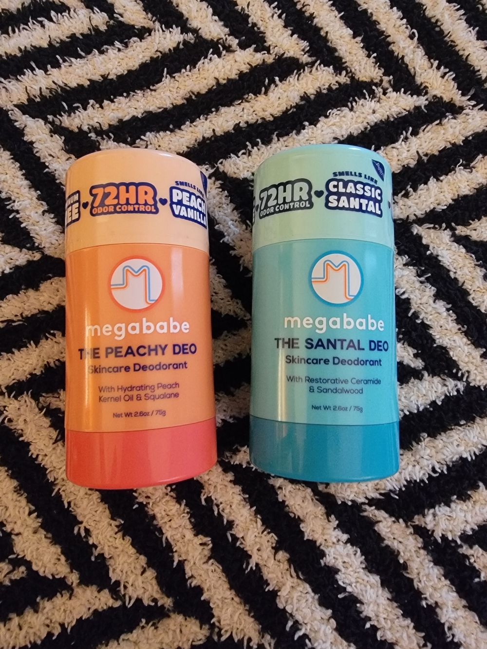 Two Megababe Deodorants
